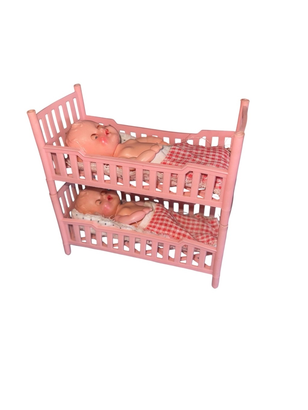 Vintage baby dolls and beds